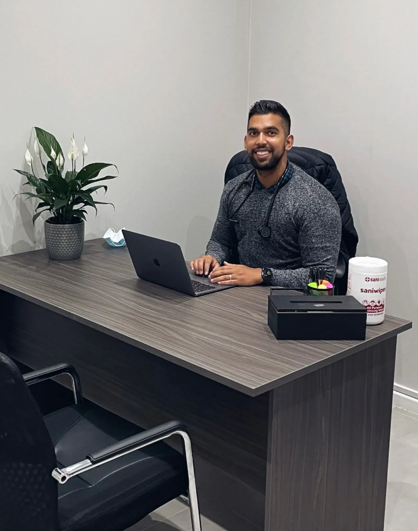 Dr Gaffoor, a South African medical doctor, in his practice