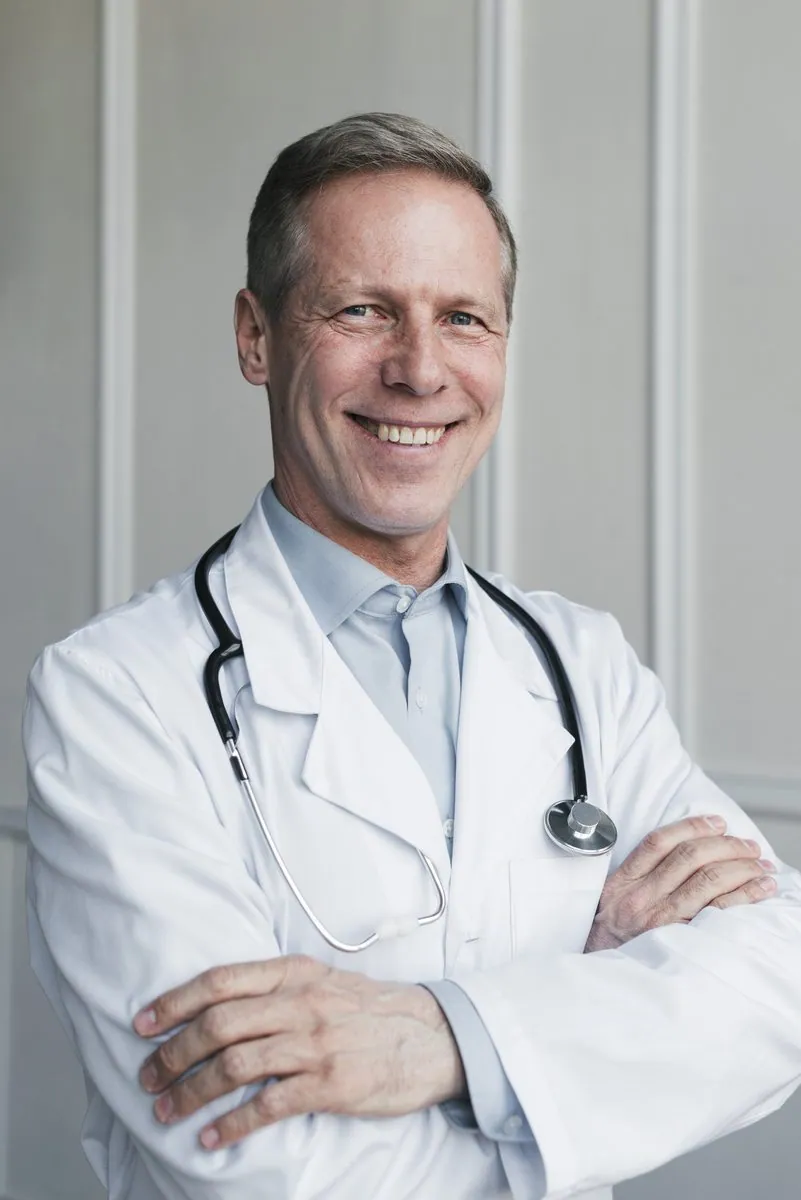 Rosewood Family Practice social media post featuring a friendly doctor