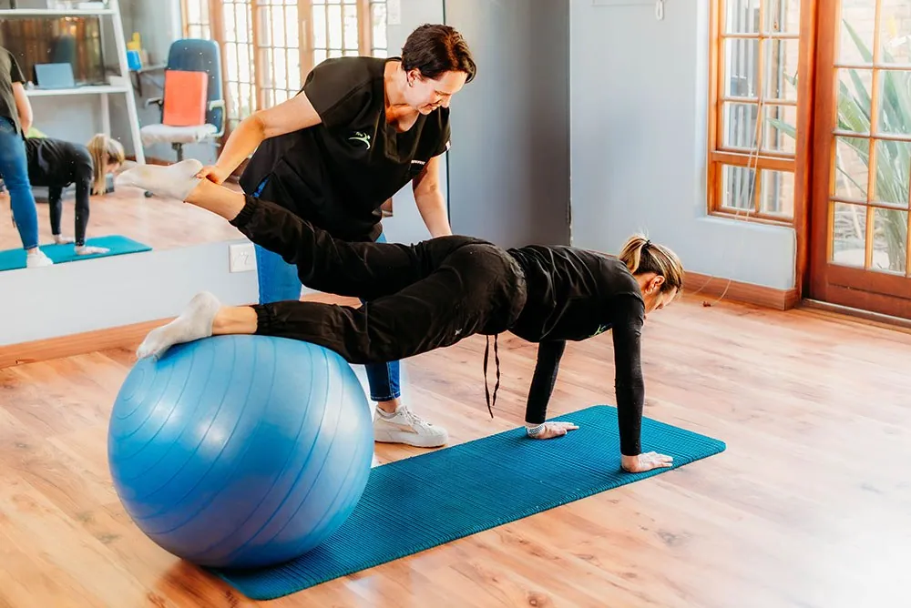 A South African physiotherapist with a patient